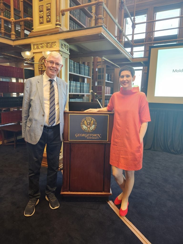 Dennis Deletant and Diana Dumitru in Riggs Library at Georgetown University