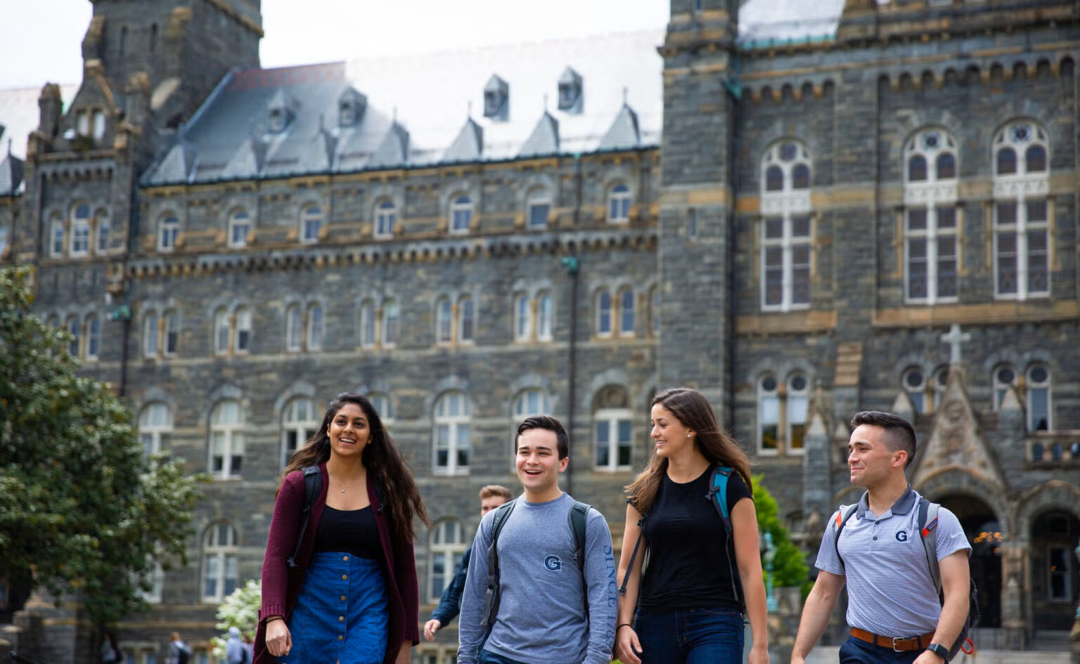 Undergraduate students in front of Healy Hall